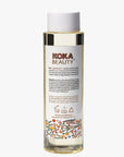 Koka Beauty skincare product bottle on a white background