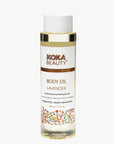 Koka Beauty lavender body oil bottle on a white background