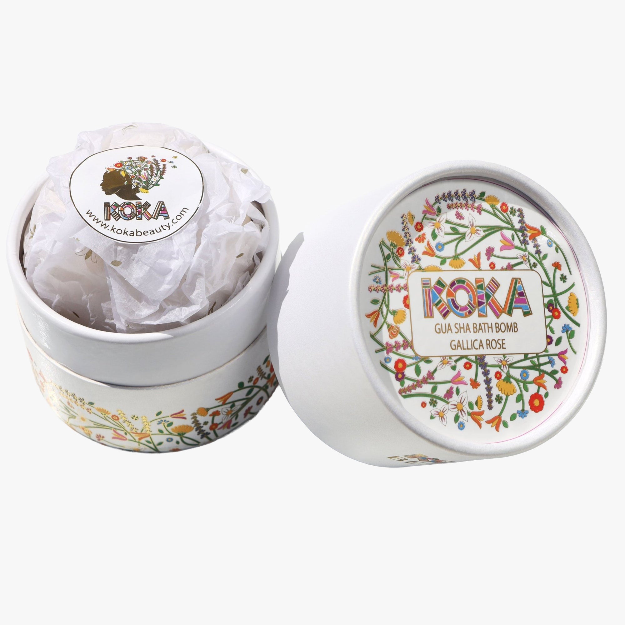 Koka bath bomb in a decorative container on a white background