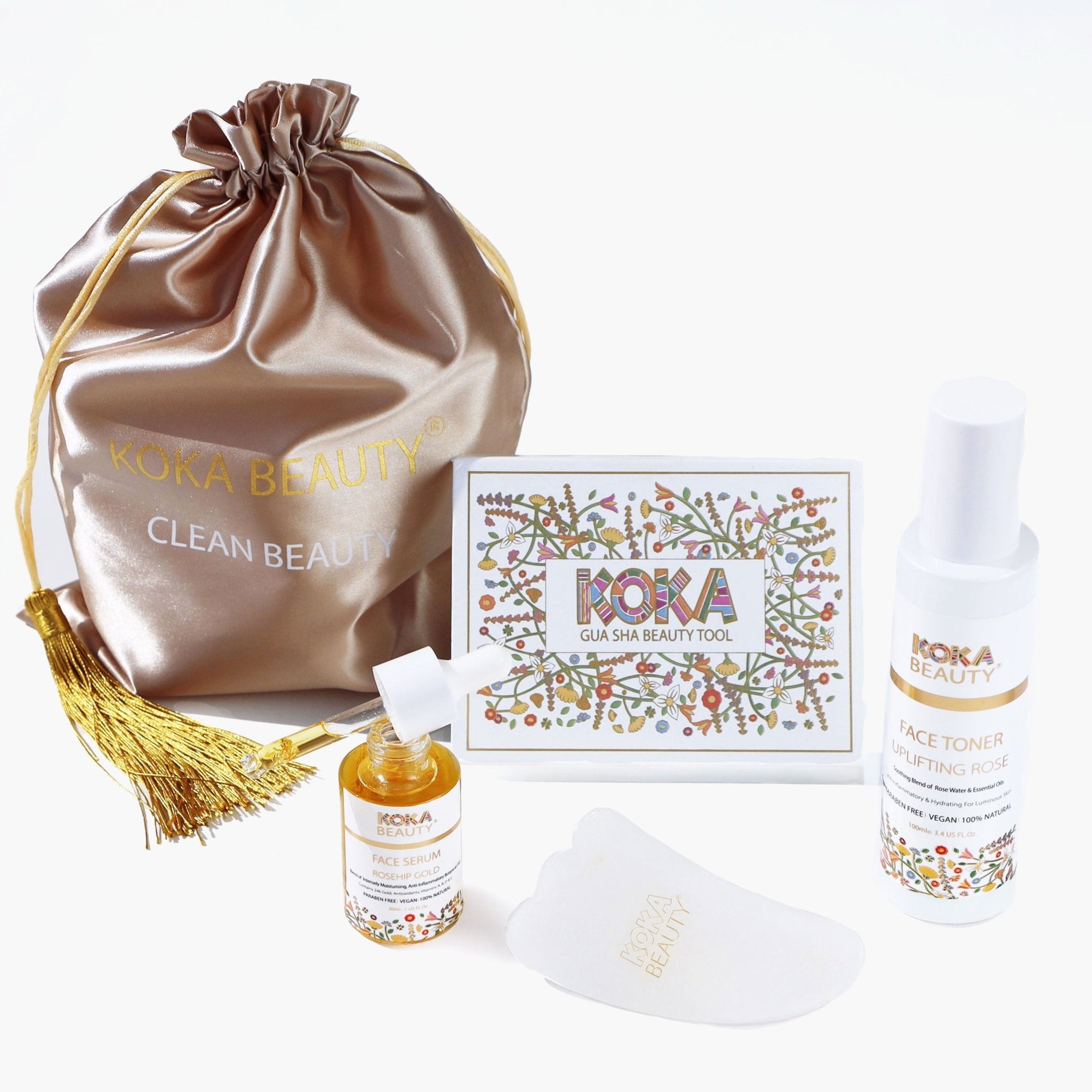 Luxury Facial Massage & Skincare Gift Set. Rosehip Gold Face Serum, Rosewater Toner and White Jade Gua Sha- Koka Beauty