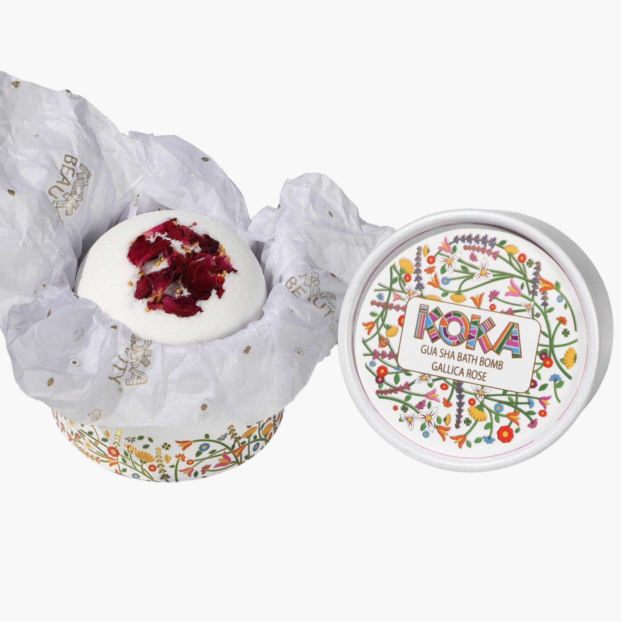 Bath bomb with floral packaging and Poka branding on a white background
