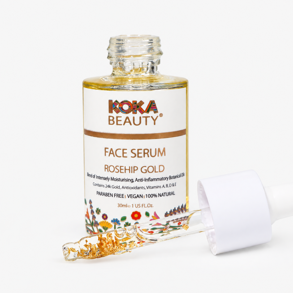Koka Beauty Rosehip Gold facial oil in a 30 ml bottle with visible gold leaf.